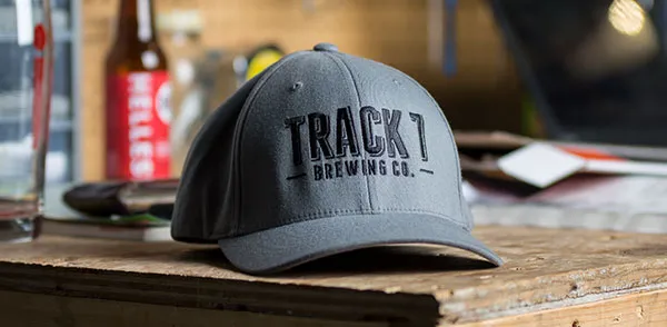 Embroidered gray baseball hat.
